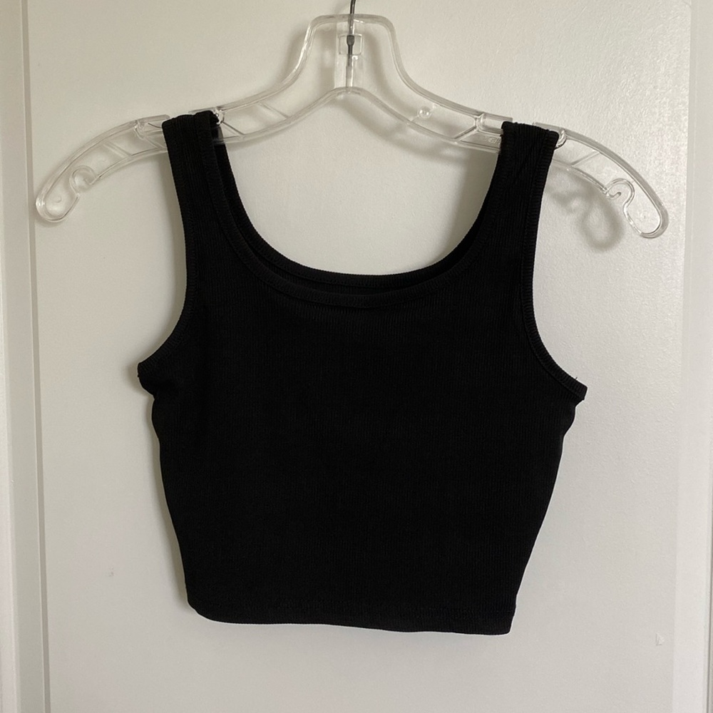 brown, black, and tan tank tops